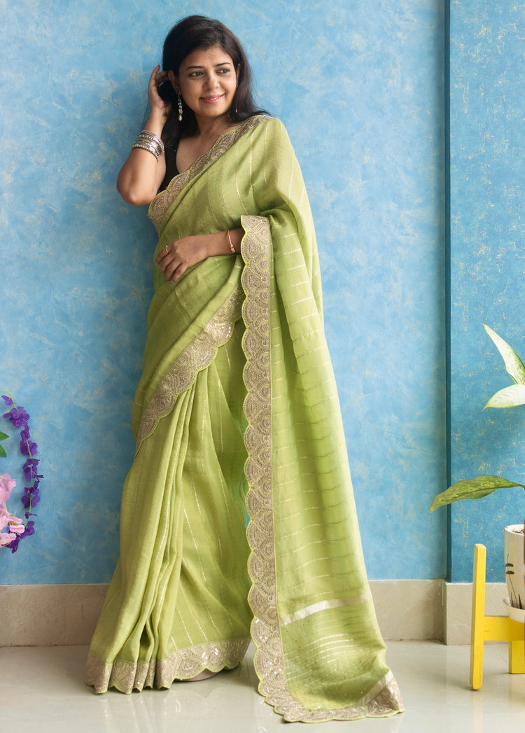 Pista Green Tissue Saree with Golden Scallop Border