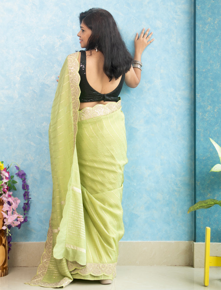 Pista Green Tissue Saree with Golden Scallop Border