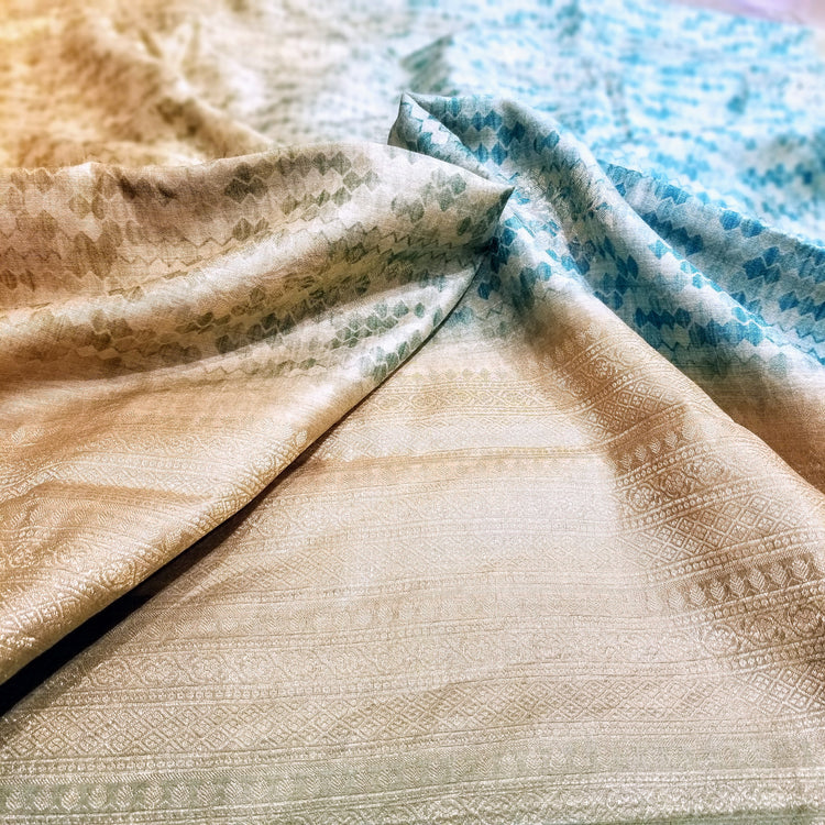 Handwoven Pure Muga Silk  Banarasi Sari with Digital Print in shades of Sea blue on Golden