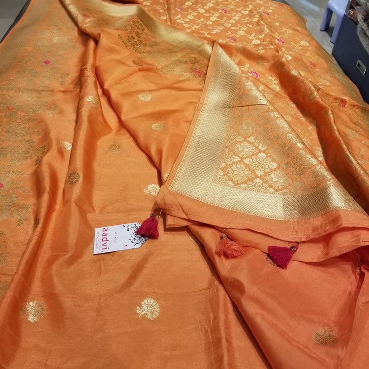 Pastel Peach Color Crepe Marble Silk Handwoven Sari with intricate golden floral all-over work