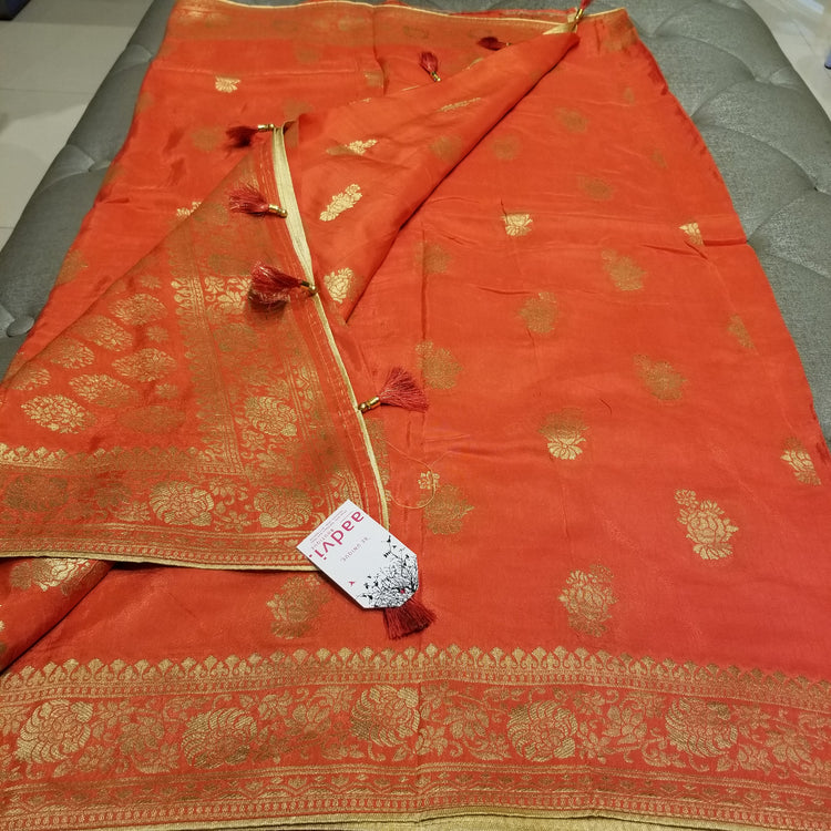 Deep Pastel Orange Color Crepe Marble Silk Handwoven Sari with intricate golden floral all-over work