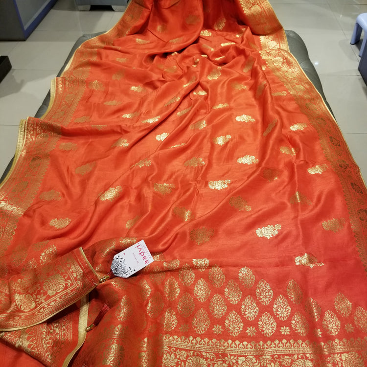 Deep Pastel Orange Color Crepe Marble Silk Handwoven Sari with intricate golden floral all-over work