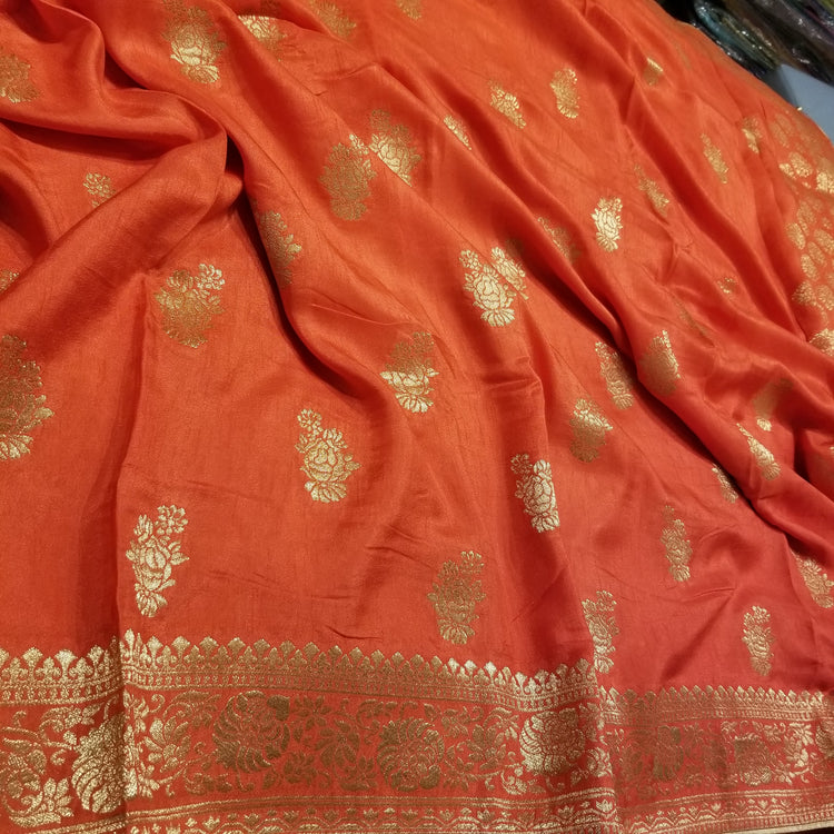 Deep Pastel Orange Color Crepe Marble Silk Handwoven Sari with intricate golden floral all-over work