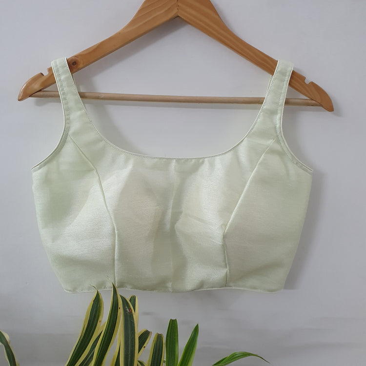 Spinach White Sleeveless Designer Blouse