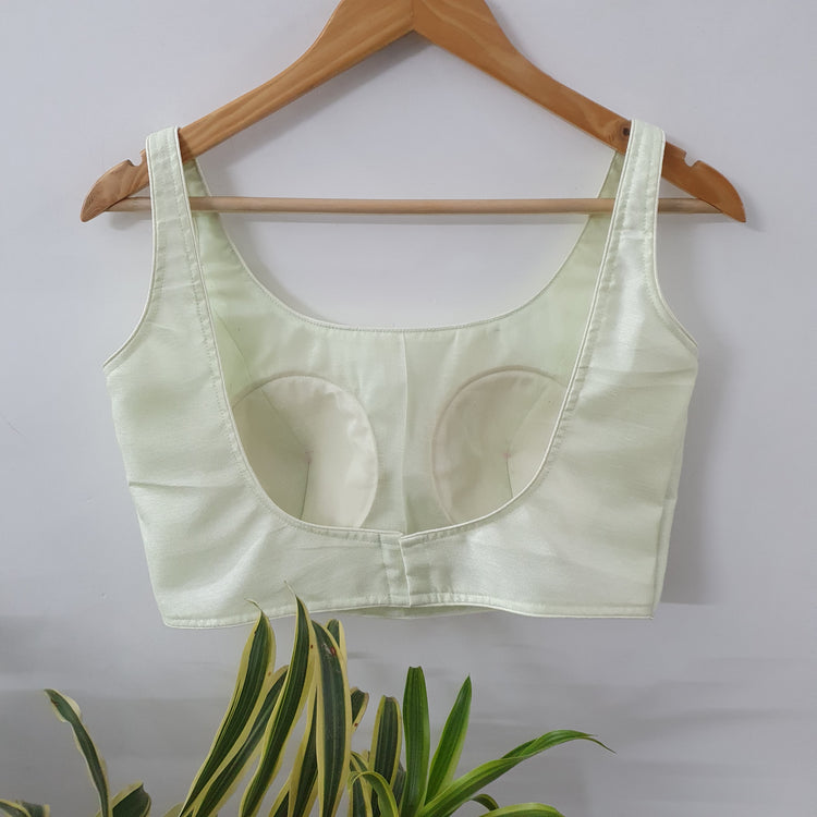 Spinach White Sleeveless Designer Blouse