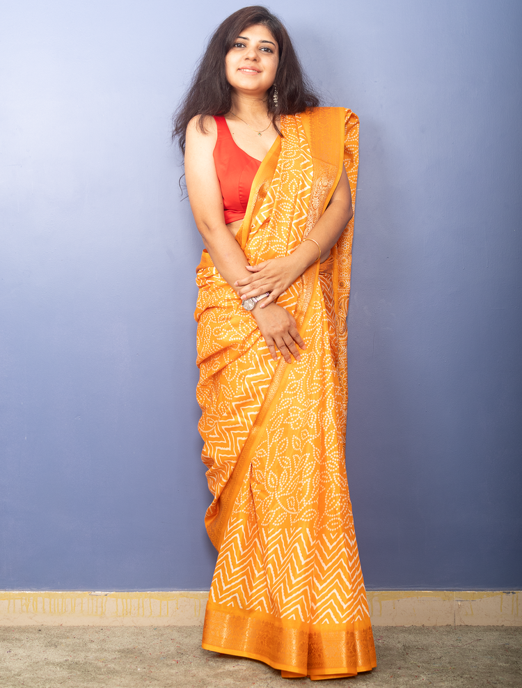 Tangerine Yellow Bandhni Printed Crepe Silk Sari