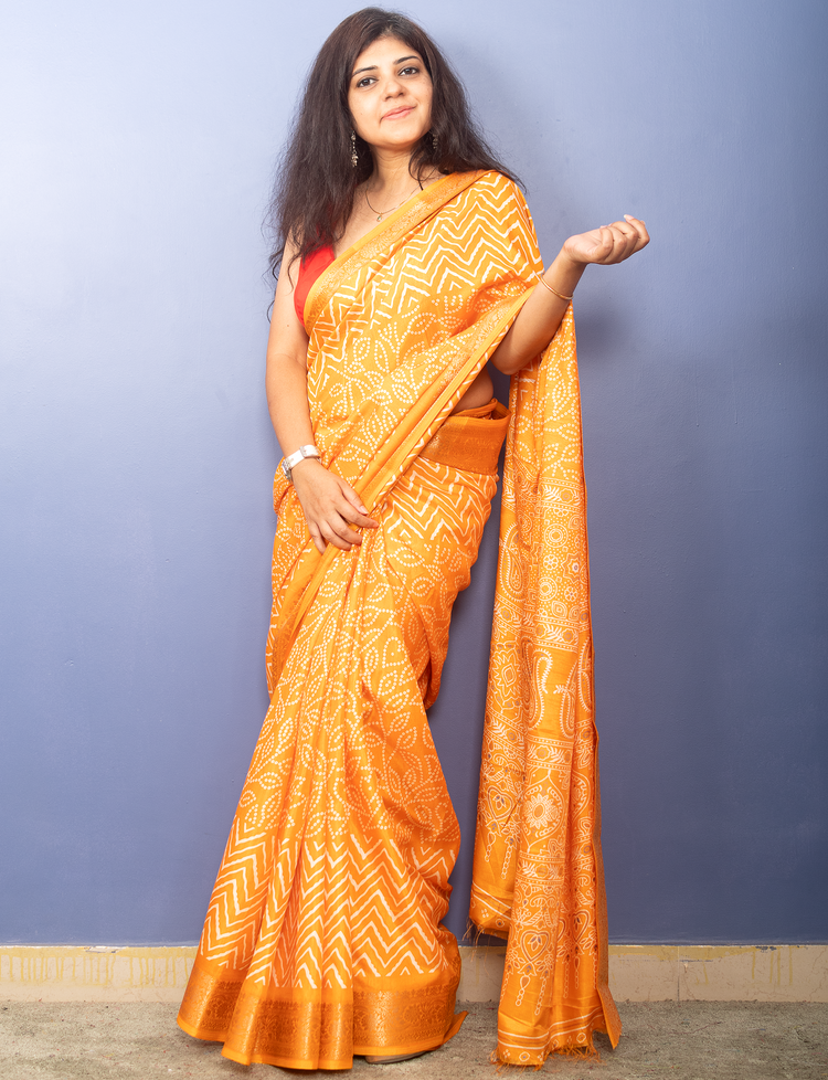 Tangerine Yellow Bandhni Printed Crepe Silk Sari