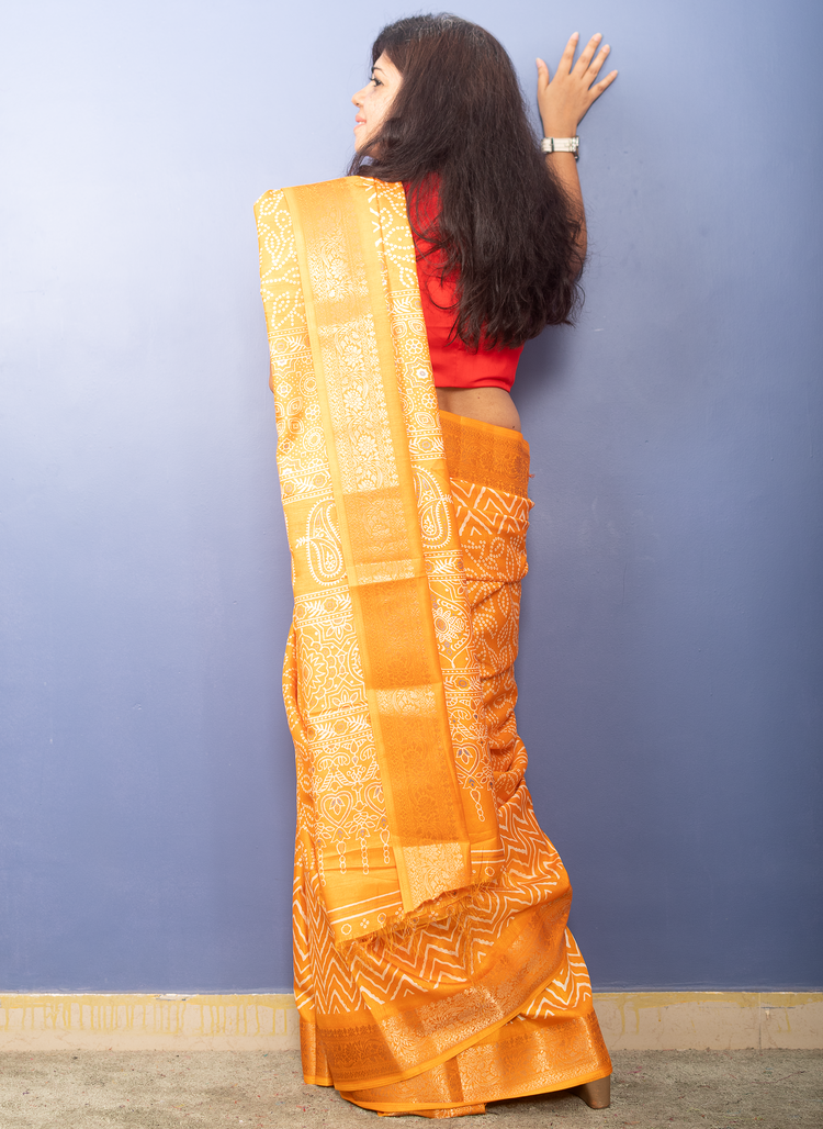 Tangerine Yellow Bandhni Printed Crepe Silk Sari