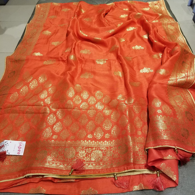 Deep Pastel Orange Color Crepe Marble Silk Handwoven Sari with intricate golden floral all-over work