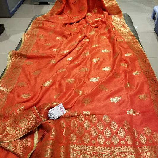 Deep Pastel Orange Color Crepe Marble Silk Handwoven Sari with intricate golden floral all-over work