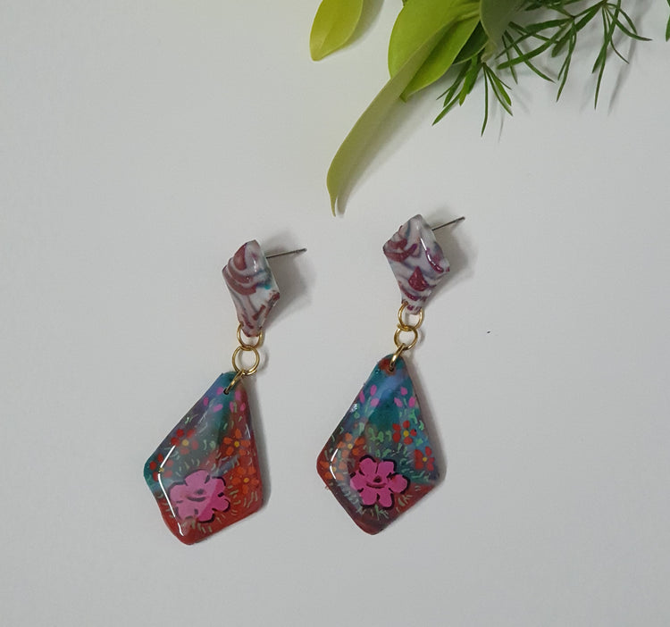 Flora - Clay and Resin Earrings with Free Hand Art.