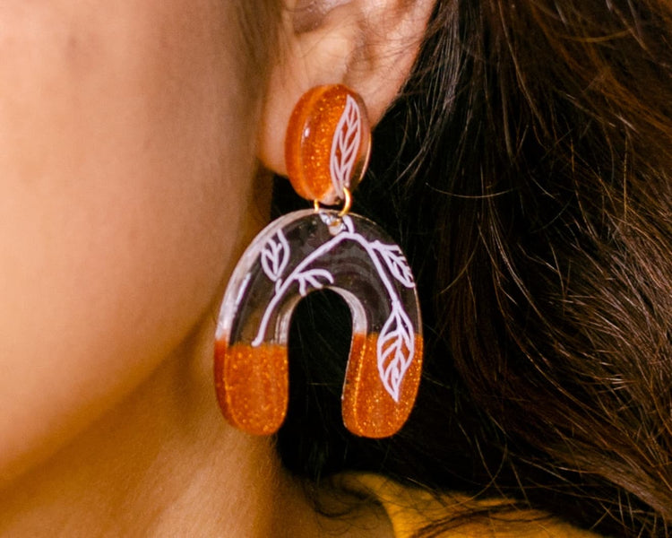 Meraki - Gold and Clear Resin Earrings with Free Hand Art.