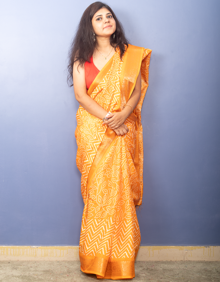 Tangerine Yellow Bandhni Printed Crepe Silk Sari