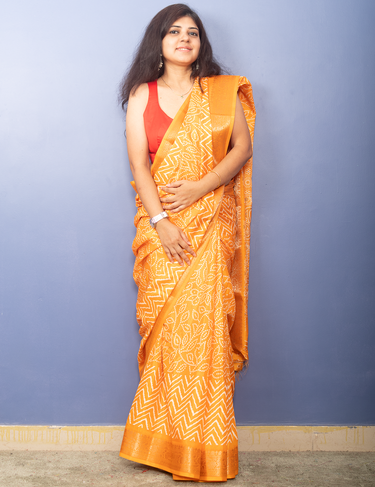 Tangerine Yellow Bandhni Printed Crepe Silk Sari